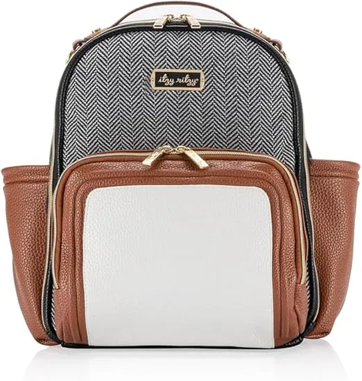 Itzy Ritzy Mini Plus Diaper Bag Backpack – Chic Mini Diaper Bag with Changing Pad, 10 Total Pockets (6 Internal and 4 External), Grab-Top Handle and Rubber Feet (Coffee & Cream)