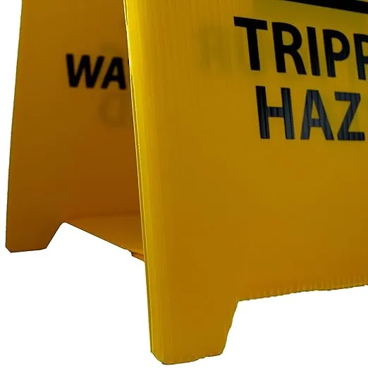 NMC FS36 CAUTION TRIPPING HAZARD Sign with Graphic - 12 in. x 19 in. Corrugated Plastic, Double-Sided Floor Sign with Black on Yellow