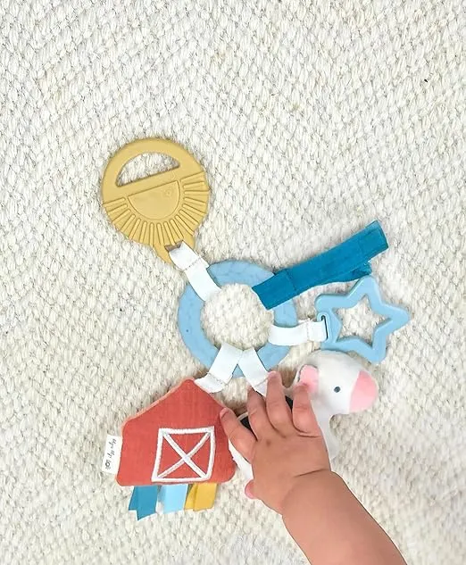 Itzy Ritzy Farm Toy Gift Set - Includes Cow Lovey & Farm-Themed Busy Ring Car Seat and Stroller Toy - Features Crinkle Sounds, Engaging Textures & Silicone Teething Relief (Farm)