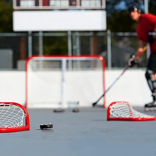 Franklin Sports NHL Street Roller Hockey Pucks - Pro Commander Outdoor Roller Hockey Pucks for Practice + Training - Outdoor Hockey Street Pucks with Rollers - 24 Bulk Packs, 6 Packs + Single Pucks